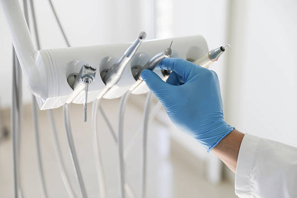 Professional Tooth Extraction technician working in Fletcher, OK